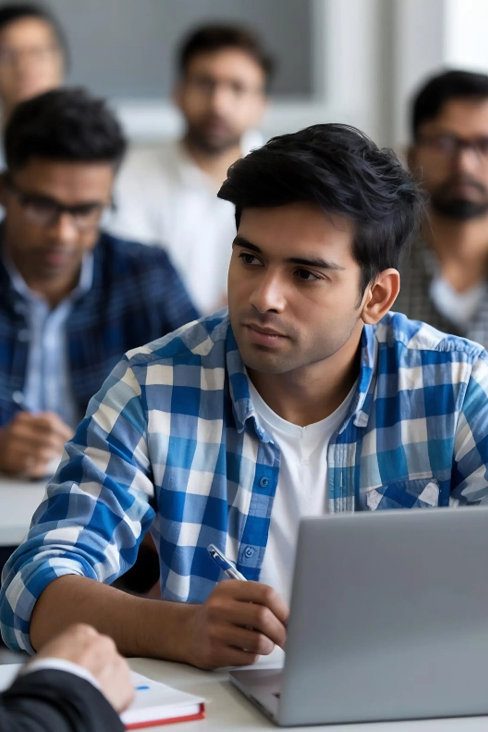 portrait-indian-happy-businessman-using-laptop-computer